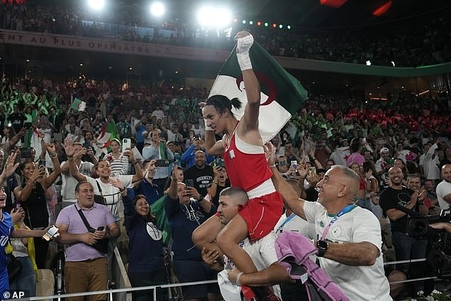 Khelif paraded in the ring on his trainer's shoulders in front of hundreds of fans