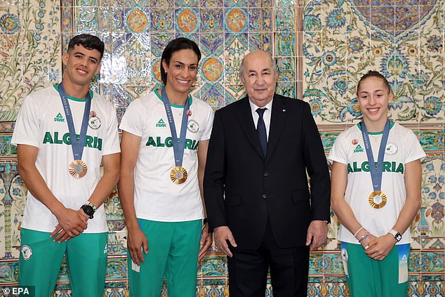 Khelif (center left) was the first Algerian to win Olympic gold in boxing since lightweight fighter Hocine Soltan in 1996.