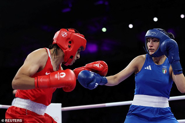 Angela Carini (right) lost her battle with Khelifi after just 46 seconds at Roland Garros